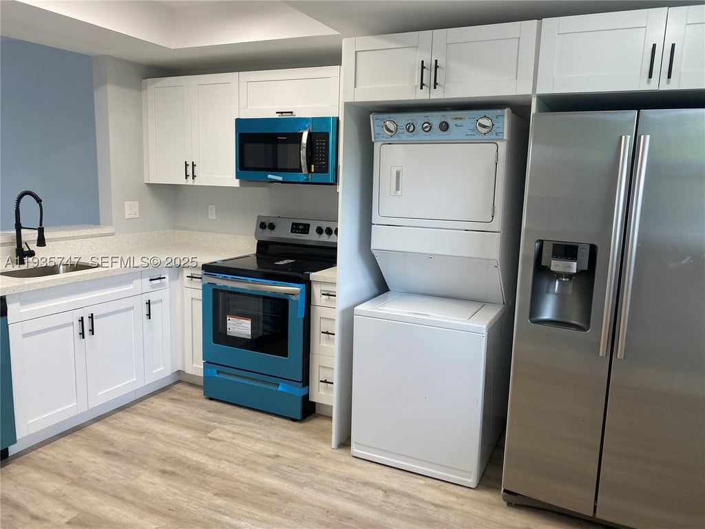 Photo of 2500 Coral Springs Dr #206, Coral Springs, FL 33065 (MLS # A11935747)