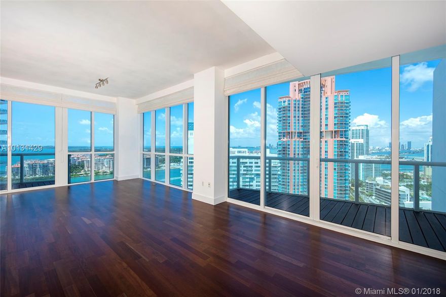 This spacious corner residence at the Continuum features fine hardwood floors, open living & dining areas, a split bedroom layout & 4 private balconies with amazing ocean, Fisher Island, Virginia Key & city views. Open kitchen sports top Miele appliances, granite counters, polished wood cabinetry. Master suite w/walk-in closet, 2 balconies w/ocean & city views, master bath w/sunken tub. Continuum 5-Star amenities include 24 hour Security/Valet, 3 Tennis Courts, 23,000SF Sporting Club & Spa. Monthly main fee $1,595.09 and $1,371.88 ( master association)