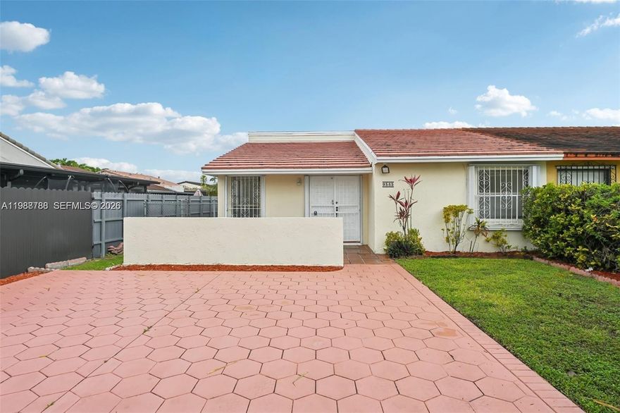 PROPERTY BIGGER THAN TAX ROLL ACTUAL SIZE 1391 SQ FT. Beautiful single-story twin home with 2 bed /2 bath plus a den and a huge family offering comfort and convenience. This light-filled home features a spacious open layout, tile flooring throughout, and a functional kitchen with plenty of cabinet space and breakfast counter. Enjoy the added convenience of an in-unit washer and dryer and a private outdoor patio ideal for entertaining. With its private driveway and great location near major roads, shopping, and dining, this home is perfect for easy South Florida living. No association. The addition to the house was done with permits so it is legal.