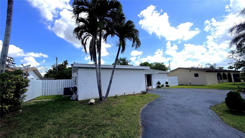 Photo of 9431 NW NW 24th St, Sunrise, FL 33322 (MLS # A12007815)