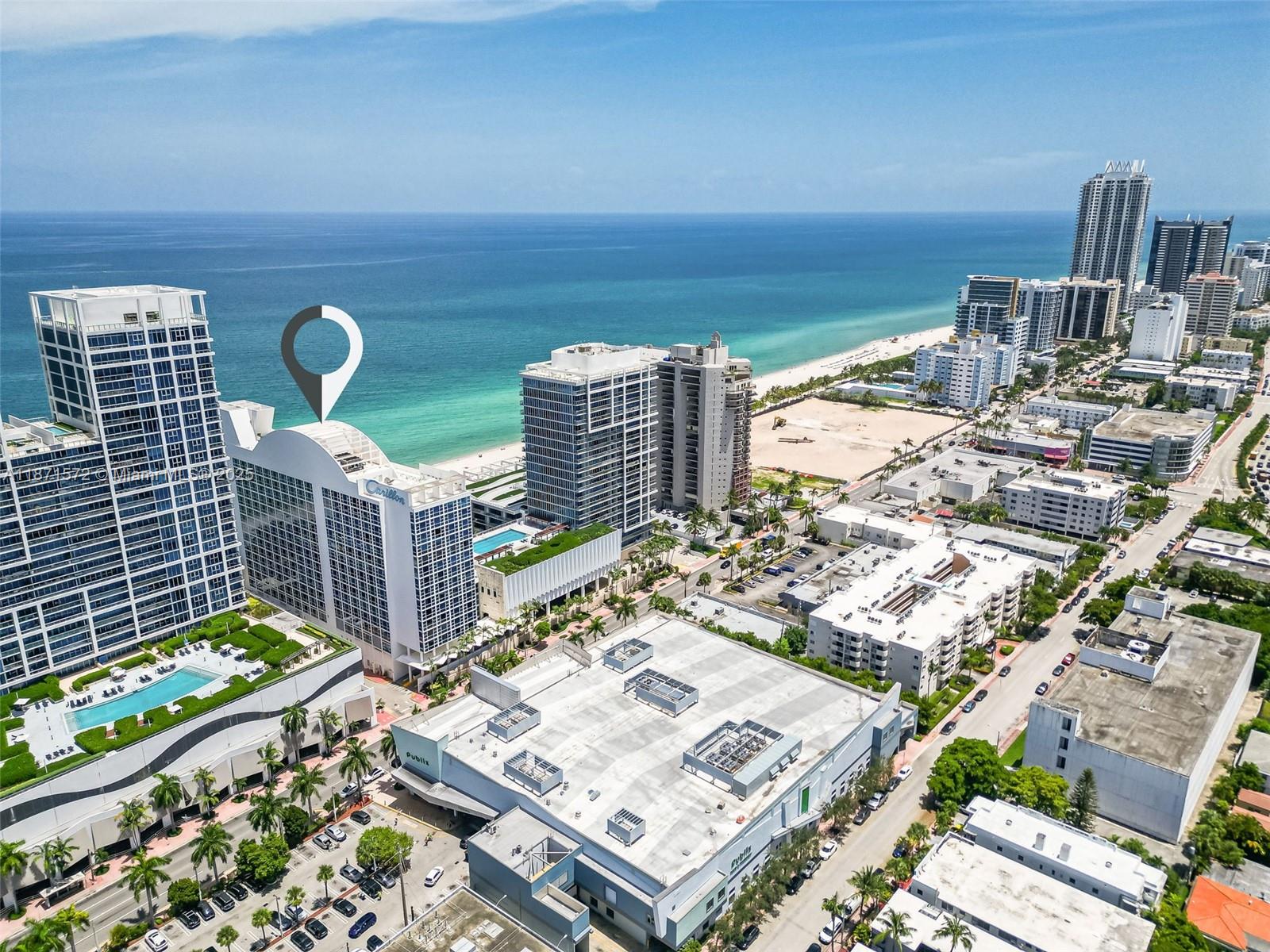 Live or invest in luxury at the Carillon Hotel & Spa! This spacious 1-bedroom, 1-bath suite features an open terrace and added sofa bed for extra rental income potential. Enjoy unmatched resort amenities: daily fitness classes, 4 pools, spa & wellness center, beach service, and on-site dining. Owners can rent nightly (self-managed or via hotel program) and also enjoy monthly food & spa credits plus 8-spa and gym memberships annually. Walkable neighborhood with Publix across the street.