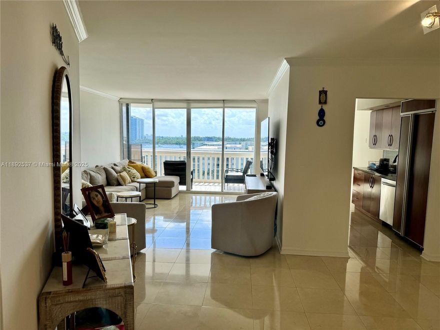 STUNNING WATER VIEWS FROM THIS 2 BR/2 BATH UNIT WITH MARBLE AND WOOD FLOORS . SMOOTH CEILINGS, UPDATED KITCHEN WITH STAINLESS STEEL APPLIANCES, GRANITE COUNTERTOPS &ALL NEW CABINETRY . WIDE TERRACE. BUILDING IS COMPLETELY REMODELED AND INCL: LIBRARY, GYM, MOVIE THEATER, CARD AND GAME ROOM. LIVE IN PRESTIGIOUS WILLIAMS ISLAND W/ FULL AMENITIES: 15 TENNIS COURTS, 4 PICKLEBALL COURTS, 3 RESTAURANTS, STARBUCKS, STATE OF THE ART SPA, MARINA, WALK/JOG PATH, KIDS PLAYGROUND, COURTESY BUS, SYNAGOGUE, SELF PARKING, VALET PARKING & MUCH MORE & AVENTURA CHARTER SCHOOLS.** CAN BE PURCHASED FURNISHED**