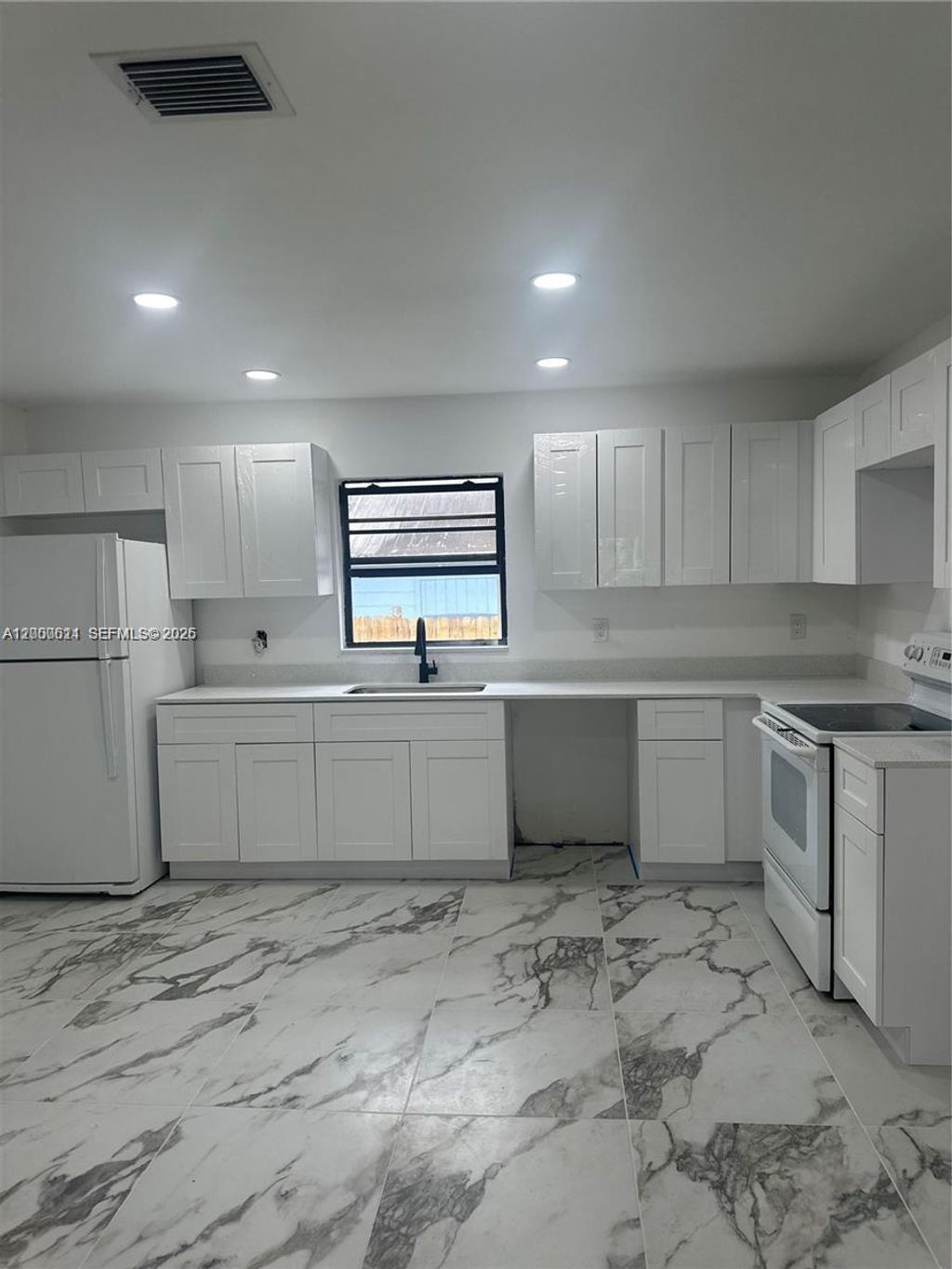 Photo of 6560 SW 49th St #1, Davie, FL 33314 (MLS # A12000611)