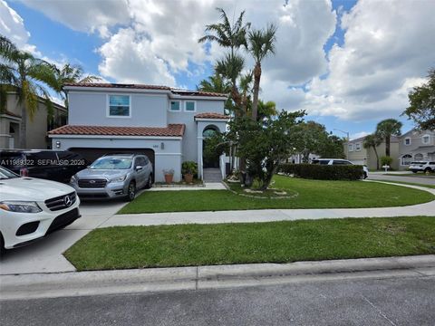 Photo of 680 NW 159th Ave, Pembroke Pines, FL 33028 (MLS # A11989322)