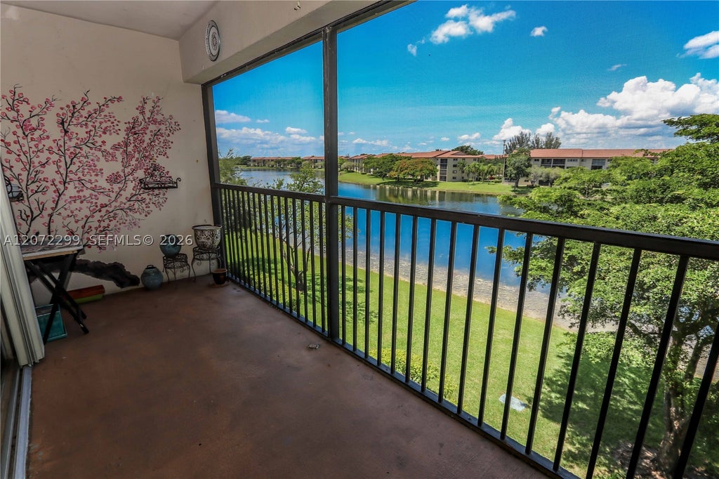 Photo of 850 SW 138th Ave #408D, Pembroke Pines, FL 33027 (MLS # A12072299)