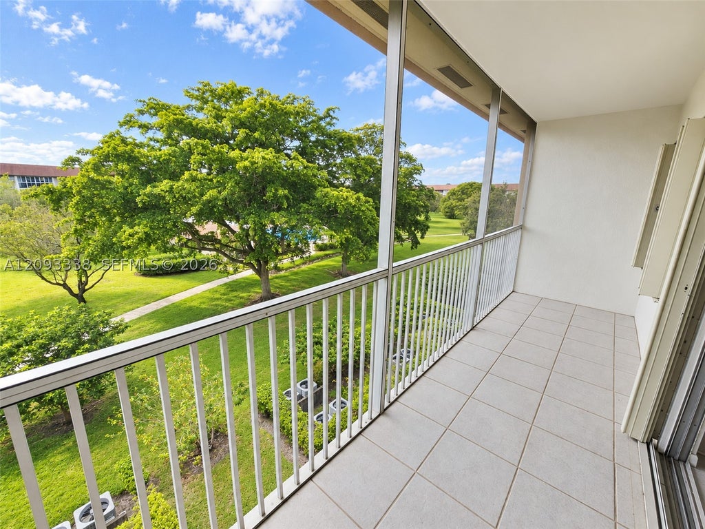 Photo of 13250 SW 7th Ct #402L, Pembroke Pines, FL 33027 (MLS # A12093338)