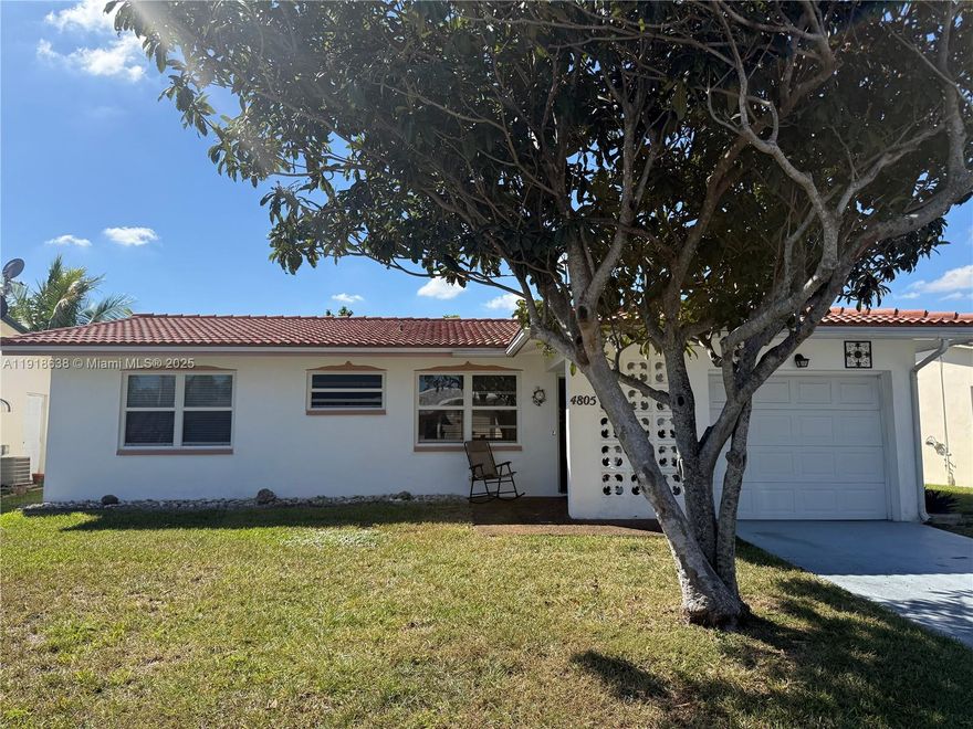 BEAUTIFUL FURNISHED TURN-KEY 2 beds/2 baths home located in the 55+ community of Mainlands. This home has a one-car garage and additional space in the driveway. Majority of the home is equipped with hurricane impact windows, back patio has shutters. Roof was done 9 years ago, AC from 2020 and water heater from 2022. Lots of natural lightning in the kitchen and equipped with dishwasher & disposal. Peaceful backyard with lots of privacy due to the trees such as avocado, mango and banana trees. Florida room has full set of outdoor furnishings and a nice BBQ.