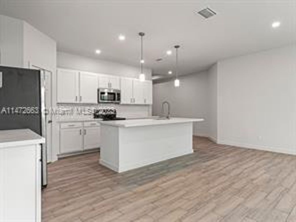 Photo of 6804 Ocala Ave, Fort Pierce, FL 34951 (MLS # A11472663)