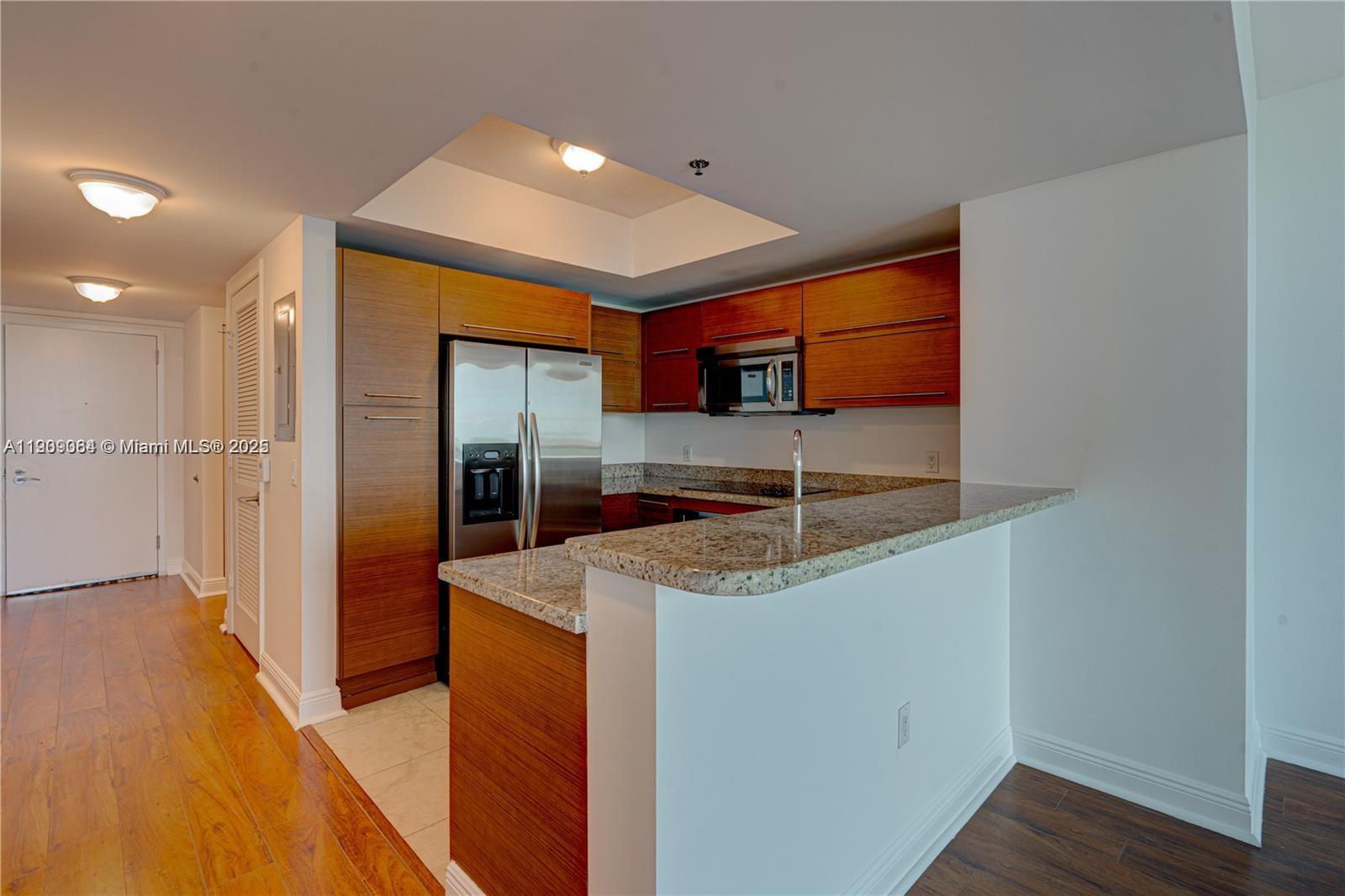 TAO SAWGRASS CONDOMINIUM - Residential Lease