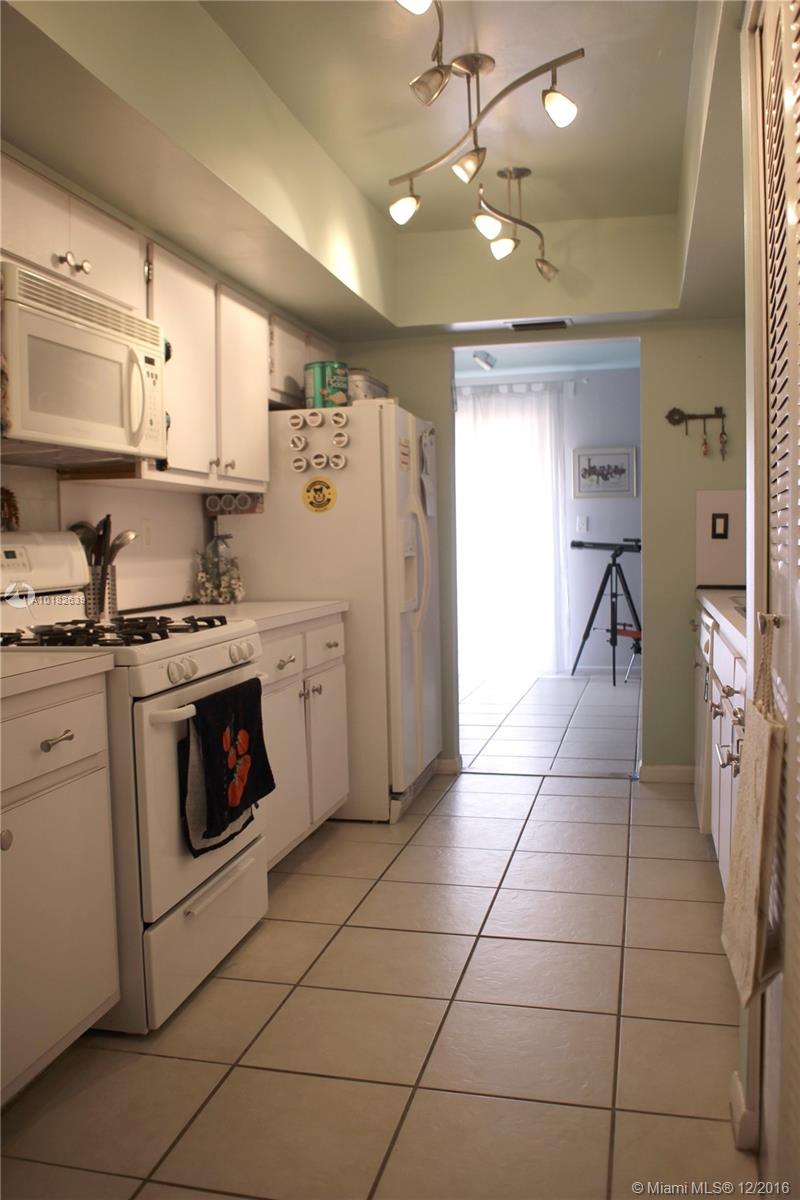 Beautiful single story 3 bedroom 2 bath patio home located on the south west area of Miami within the Sable Chase community. Walking distance to Miami Dade College, Elementary School and Shopping center. Centrally located between the 874/826 ramp and the Turnpike. Beautifully decorated, easy to maintain with ceramic tile floors, 2 small fenced outside patios, great neighbors and the development is professionally managed with plenty of amenities. Small pets OK.