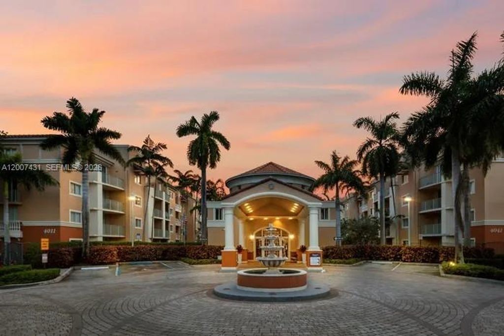 Photo of 4041 N Pine Island Rd #105, Sunrise, FL 33351 (MLS # A12007431)