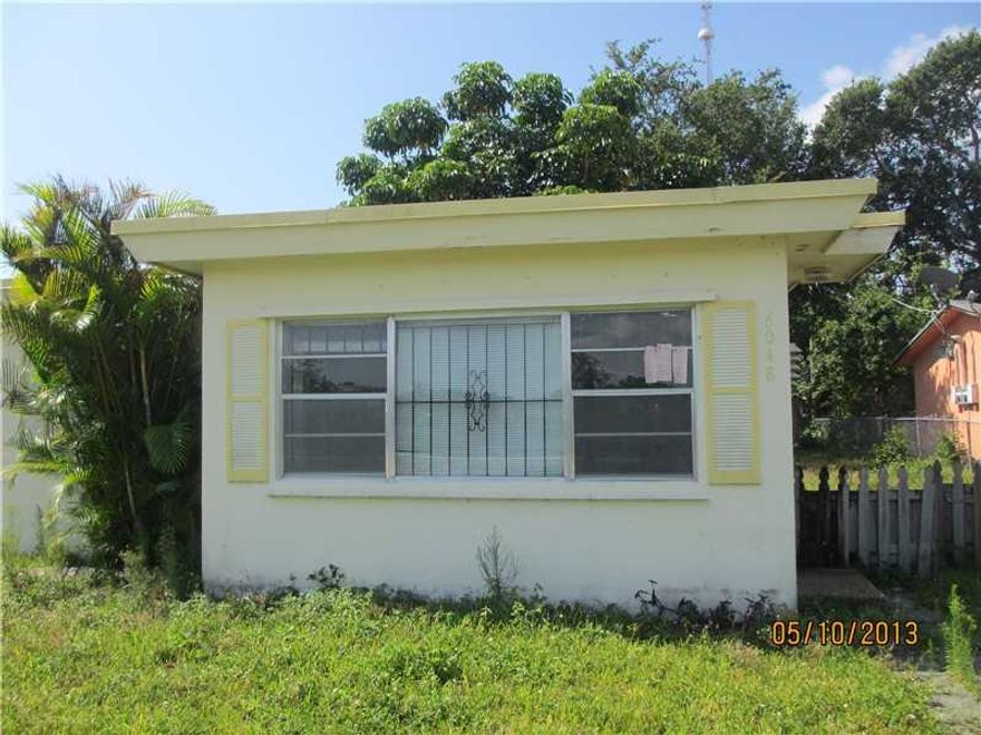 One story home.  Needs TLC.  No Kitchen, Roof leaks.  Cash Only