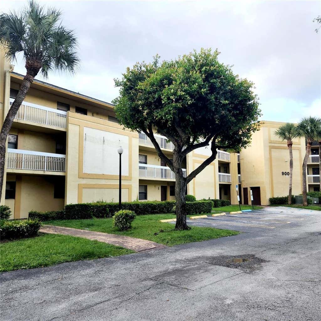 Photo of 9000 NW 28th Dr #1-108, Coral Springs, FL 33065 (MLS # A11870035)