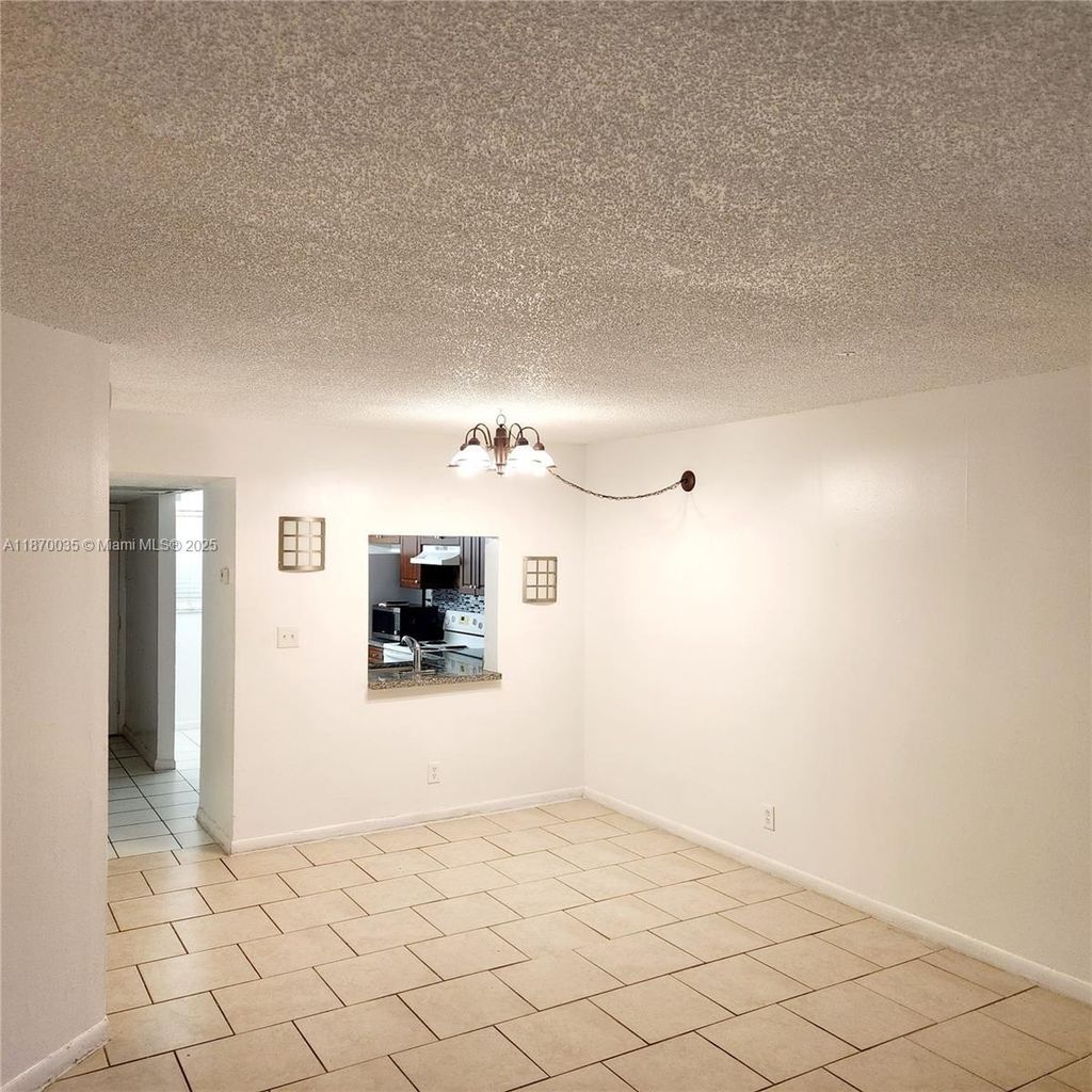Photo of 9000 NW 28th Dr #1-108, Coral Springs, FL 33065 (MLS # A11870035)