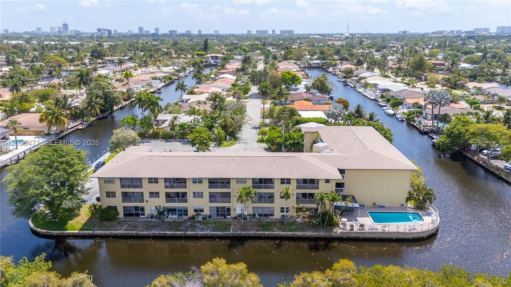 Photo of 1400 NE 57th Ct #102, Fort Lauderdale, FL 33334 (MLS # A12006471)