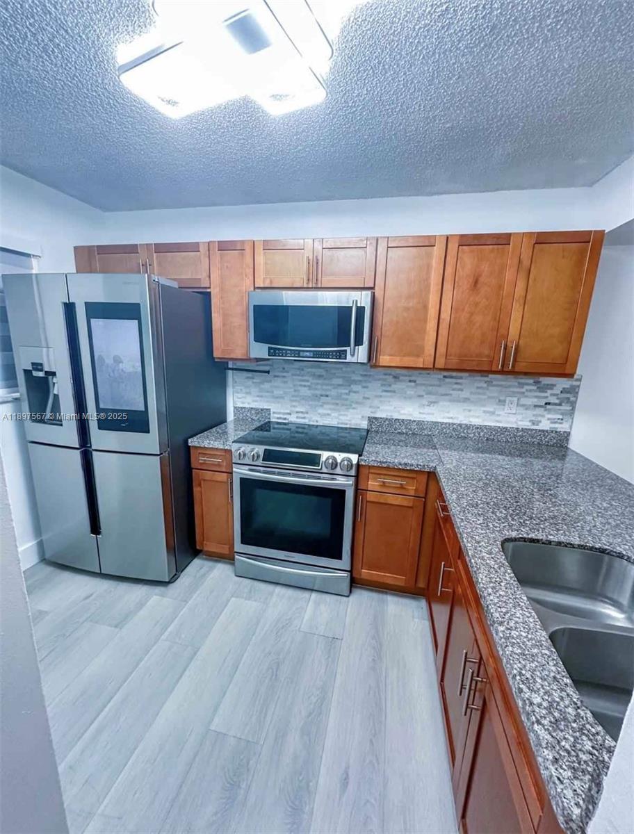 NATALIE SUITES CONDO - Residential Lease