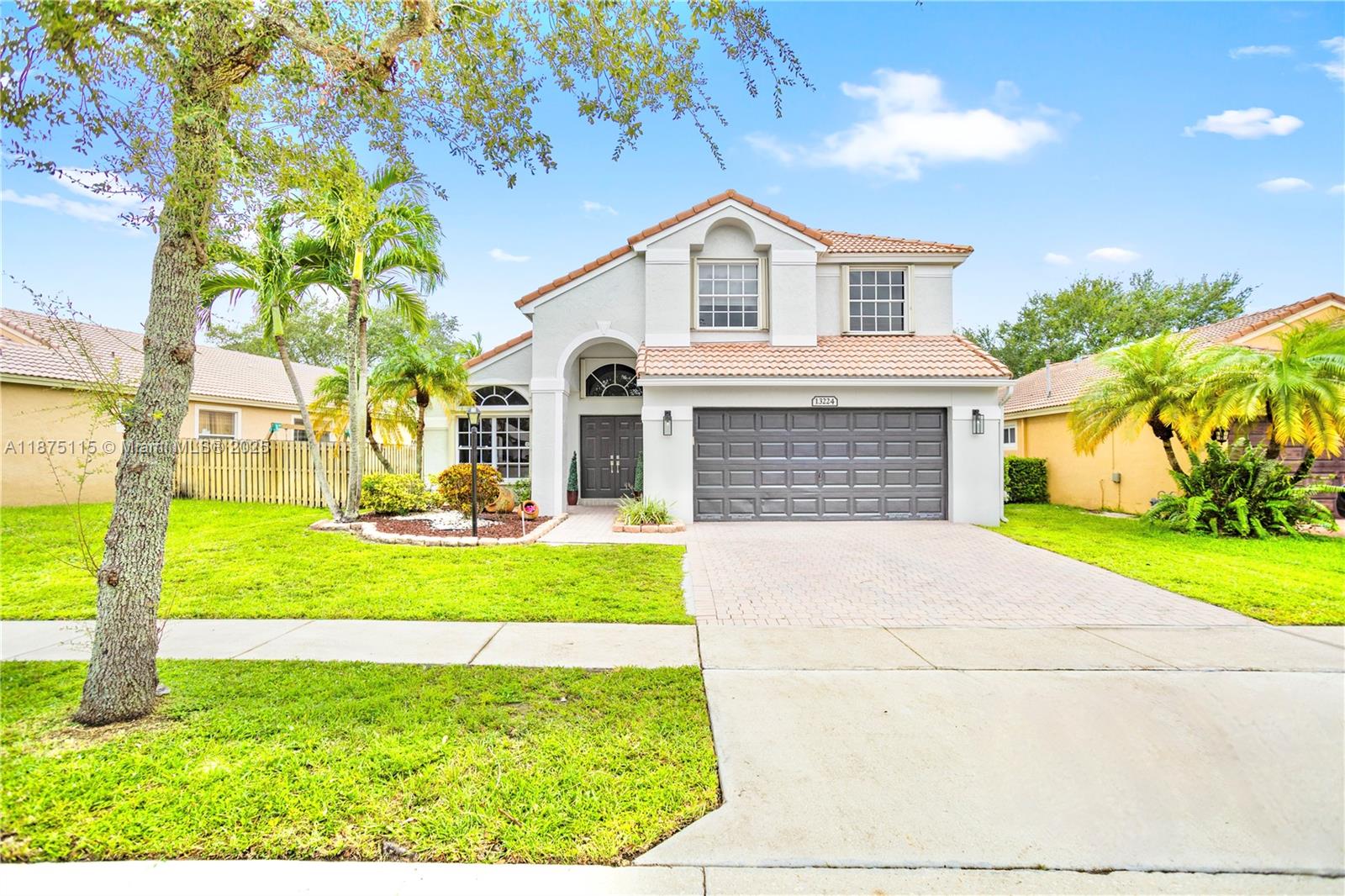 Resort-style living awaits! Enjoy an amazing clubhouse with lap pool, gym, tennis, pickleball & basketball. This modern home features a certificate of excellence roof, accordion shutters on all windows, impact French doors, and a fully fenced backyard w/ covered patio and room for a pool. Inside you’ll find updated kitchen and bathrooms, new flooring, and fresh paint throughout. Energy-efficient LED lighting and 2023 water heater provide peace of mind. Includes 2-car garage plus parking for 3 more (5 total). Move-in ready! Located in Pembroke Falls community with 24-hour security, walking trails, and easy access to top schools, shopping, dining & I-75. Association covers water for sprinklers, basic cable & internet, and alarm system, adding value and convenience.