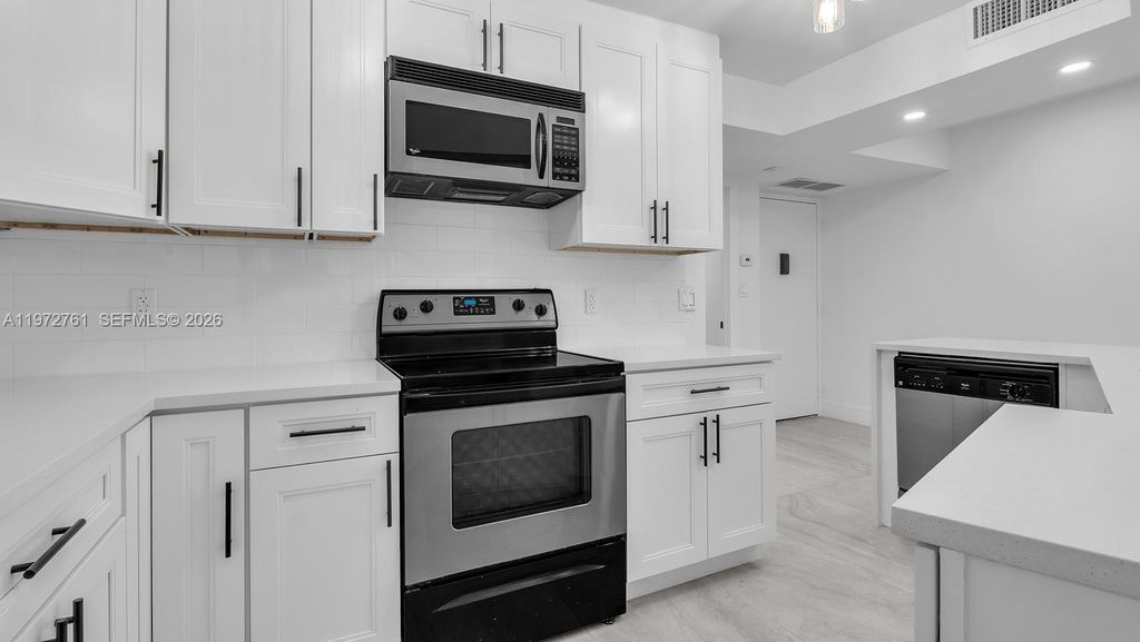 Photo of 6911 Environ Blvd #4J, Lauderhill, FL 33319 (MLS # A11972761)