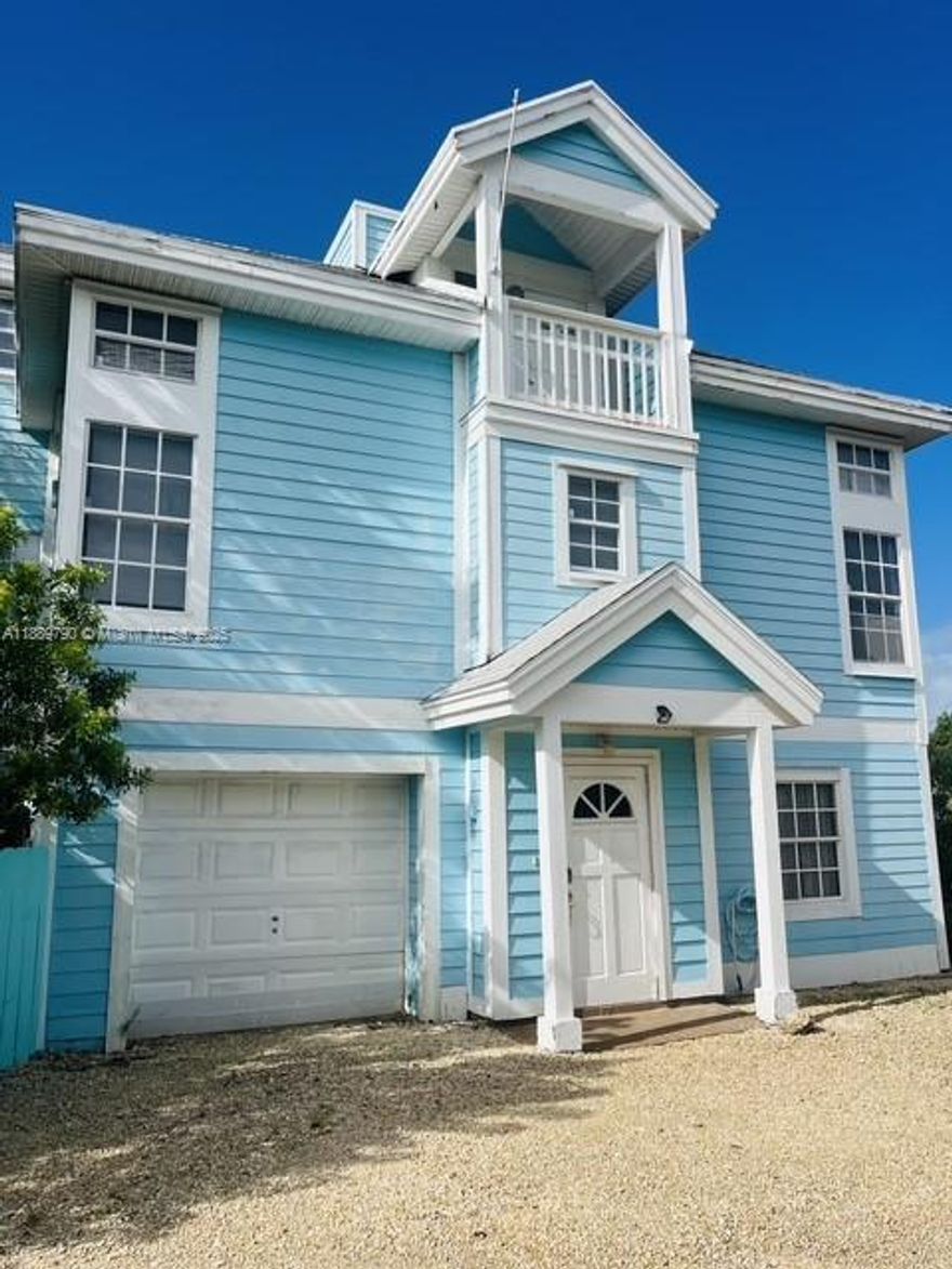 Discover this charming 3-bedroom, 2-bath furnished home tucked away on a private lot surrounded by trees, open spaces, and sandy areas. Enjoy the best of Florida Keys living with your own fishing dock, paddleboards, and kayaks included. There is a spacious kitchen with appliances. Also, there are three balconies with relaxing views. Property comes with Ample parking in the front. Just minutes from John Pennekamp State Park, top-rated schools, restaurants, and shopping. This home truly has it all—whether you’re seeking adventure or relaxation. Explore the breathtaking Key Largo scenery right outside your door!