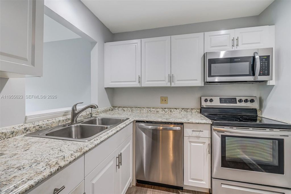 Photo of 2641 Gately Dr W #902, Lake Worth, FL 33415 (MLS # A11955623)