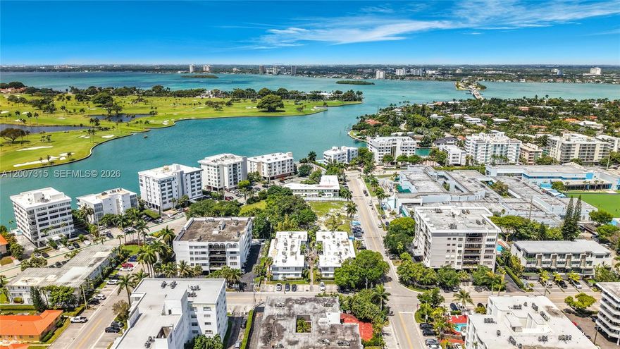 Welcome to Bay Harbor living at its finest. This beautifully maintained corner unit offers a rare combination of privacy, natural light, and functionality. Featuring 2 bedrooms and 2 bathrooms, this residence at 9280 Bay Harbor Terrace delivers the perfect blend of comfort, smart design, and prime location in one of Miami’s most desirable communities. Unit #25 showcases a well-designed layout that maximizes space and flow, creating a bright and open feel throughout. As a corner unit, enjoy additional windows that fill the home with natural light, enhancing the spacious living and dining areas, perfect for both everyday living and entertaining. The kitchen is well-appointed with ample cabinetry and a practical layout, ready for your personal touch. This property stands out with major upgrades already completed, including a brand-new roof and new impact windows, offering peace of mind, energy efficiency, and long-term value. Both bedrooms are generously sized, providing comfort and privacy, while the two full bathrooms are well-maintained. The unit also includes the highly desirable benefit of two parking spaces, a rare find in the area. Enjoy the charm and tranquility of Bay Harbor Islands, known for its quiet, upscale setting and unbeatable proximity to everything. Just minutes from Bal Harbour Shops, world-class dining, beautiful beaches, and top-rated schools, in fact only a 5 minute to the beach. This is a fantastic opportunity to own in a high-demand area.