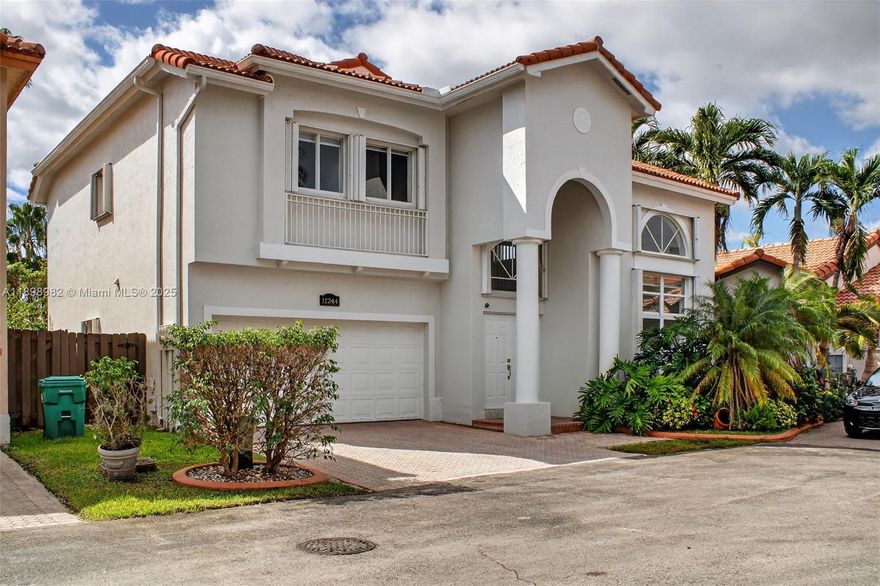 Spectacular Residence in Gated Doral Isles.  Beautifully remodeled residence offers 5 bedrooms & 3 bathrooms, one bedroom and full bath conveniently located on the first floor. Completely renovated interior, featuring new flooring, modern open-concept kitchen with s/s Appliances, cooking island, 2 car garage. Upstairs you are greeted by a mezzanine, ideal for a kids’ play zone or home office .The primary suite offers a luxurious, spa-like bathroom & expansive walk-in closets great for relaxing. Resort-style living with world-class amenities, including multiple pools, fitness center, tennis and basketball courts, soccer fields, playgrounds, cardio trails, & on-site Restaurant  . Located 3 to 4 blocks from top-rated schools, expressways, & Downtown Doral makes the best place to call home ,