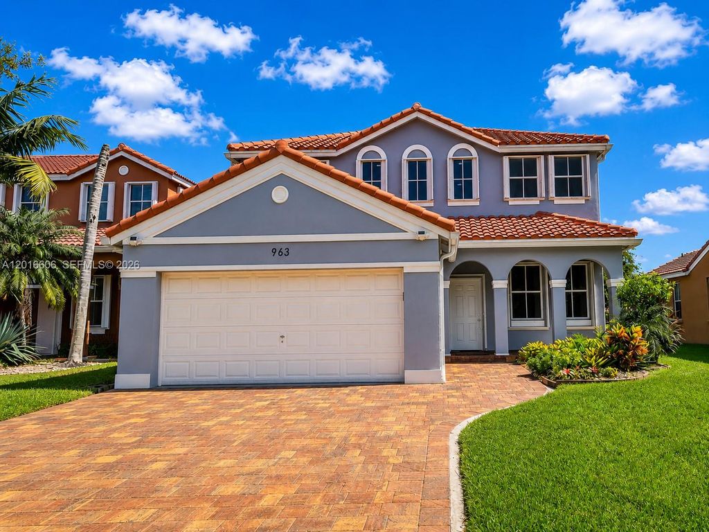 Photo of 963 Falling Water Rd, Weston, FL 33326 (MLS # A12016606)
