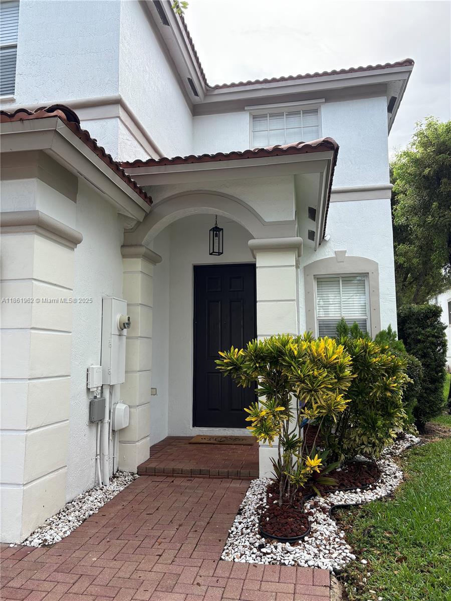 Discover this charming 3-beds 2-bath corner-unit townhome + garage, perfectly situated in the heart of Doral. This move-in ready home has been lovingly maintained by its owners and offers a welcoming blend of comfort and style. A well-kept private patio creates the perfect space for outdoor dining, entertaining, or simply relaxing. Amenities includes pool conveniently located right across from the home, a clubhouse, 24/7 security. Families will especially appreciate the highly rated schools nearby, as well as the community’s family-friendly atmosphere with parks and walking paths. With easy access to shopping, dining, and major highways, this home is ideal for those seeking convenience without sacrificing comfort. Don’t miss the chance to live in one of Doral’s most desirable communities!
