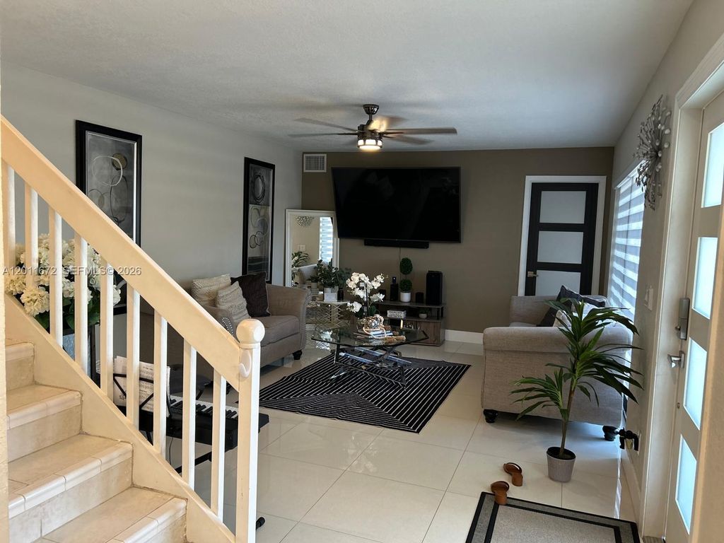 Photo of 5455 NW 59th Pl, Tamarac, FL 33319 (MLS # A12011672)