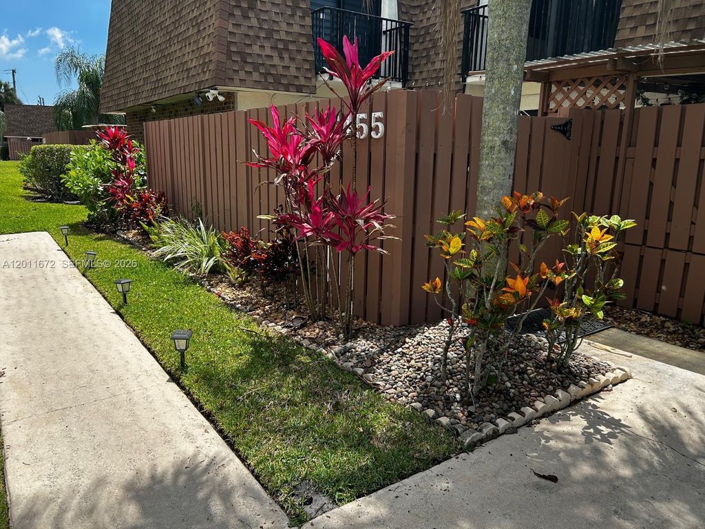 Photo of 5455 NW 59th Pl, Tamarac, FL 33319 (MLS # A12011672)