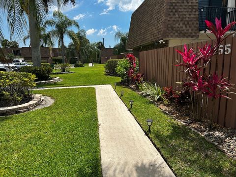 Photo of 5455 NW 59th Pl, Tamarac, FL 33319 (MLS # A12011672)