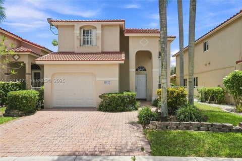 Photo of 15822 SW 16th Ct, Pembroke Pines, FL 33027 (MLS # A12076477)