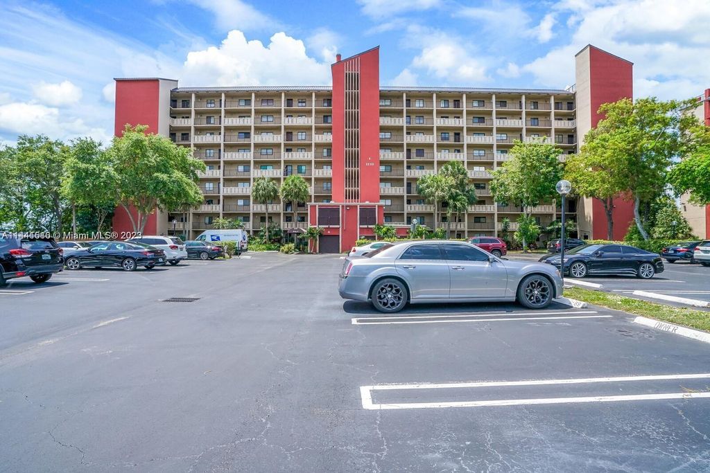 Photo of 2200 S Cypress Bend Dr #807, Pompano Beach, FL 33069 (MLS # A11441510)