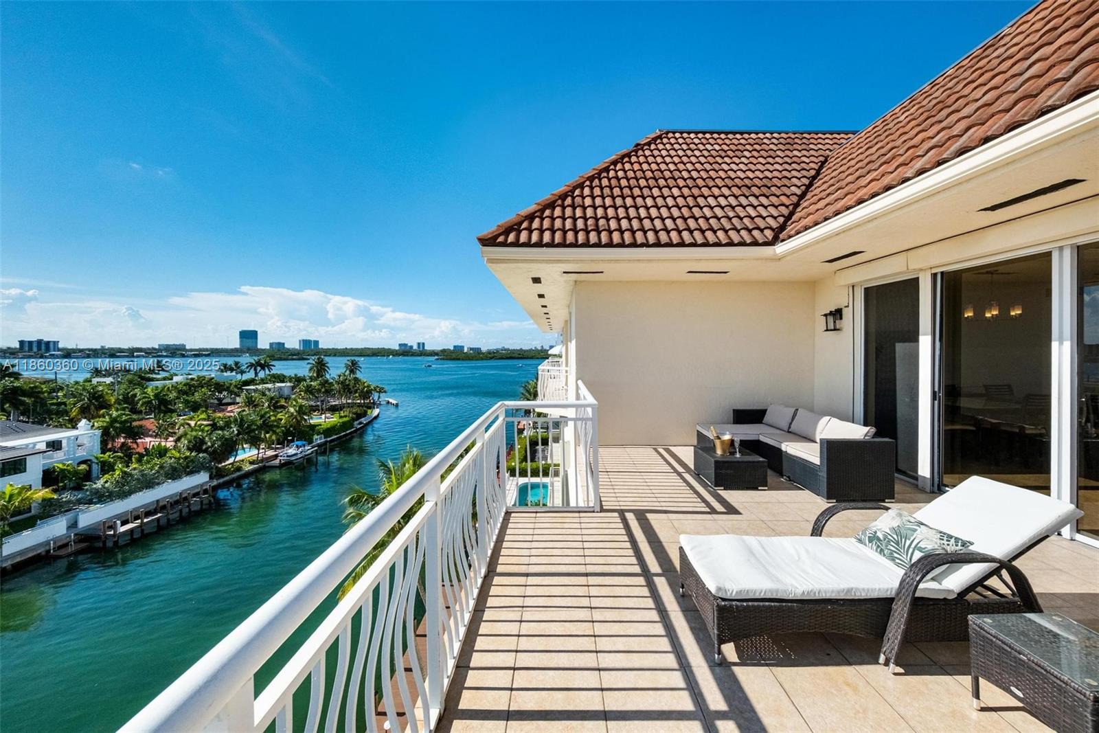 From sunrise to sunset, enjoy panoramic Miami views from spacious terraces of this one-of-a-kind corner penthouse in a waterfront boutique condo of Bay Harbor Islands. Close to 3,000 sq ft including 3 bedrooms & 3.5 baths, a small office, 2 parking spaces, and a large storage next door. Brand-new community dock available for rent. The island is just a few blocks from the beach and its exceptional recreational boardwalk. Bal Harbour's famous shopping center has recently been expanded, reaching 400,000 sq ft of luxury stores and fine dining. On the same street is located Ruth K-Broad A-rated K-8 boundary school. The small condo has reasonable maintenance fees, including mandatory reserves. It has been thoughtfully upgraded: heated pool, elevators, and a new roof completed last month.