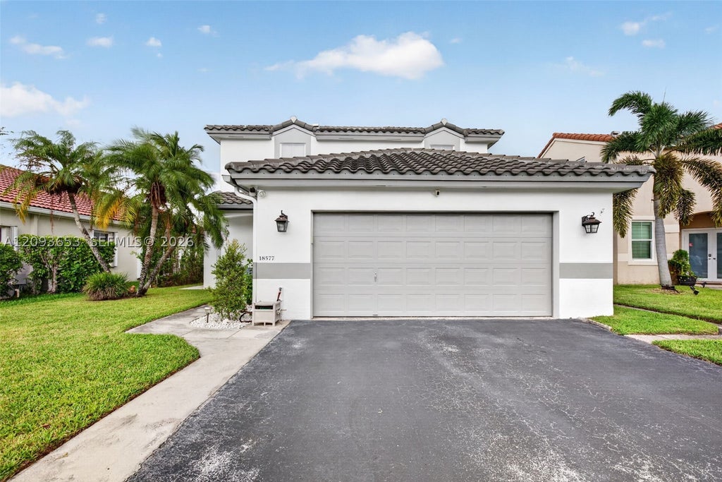 Photo of 18577 NW 19th St, Pembroke Pines, FL 33029 (MLS # A12093653)