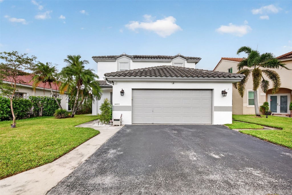 Photo of 18577 NW 19th St, Pembroke Pines, FL 33029 (MLS # A12093653)