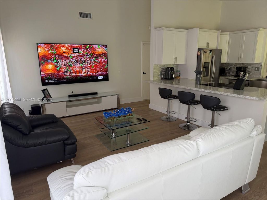 Photo of 8611 NW 51st Ct, Lauderhill, FL 33351 (MLS # A12005444)