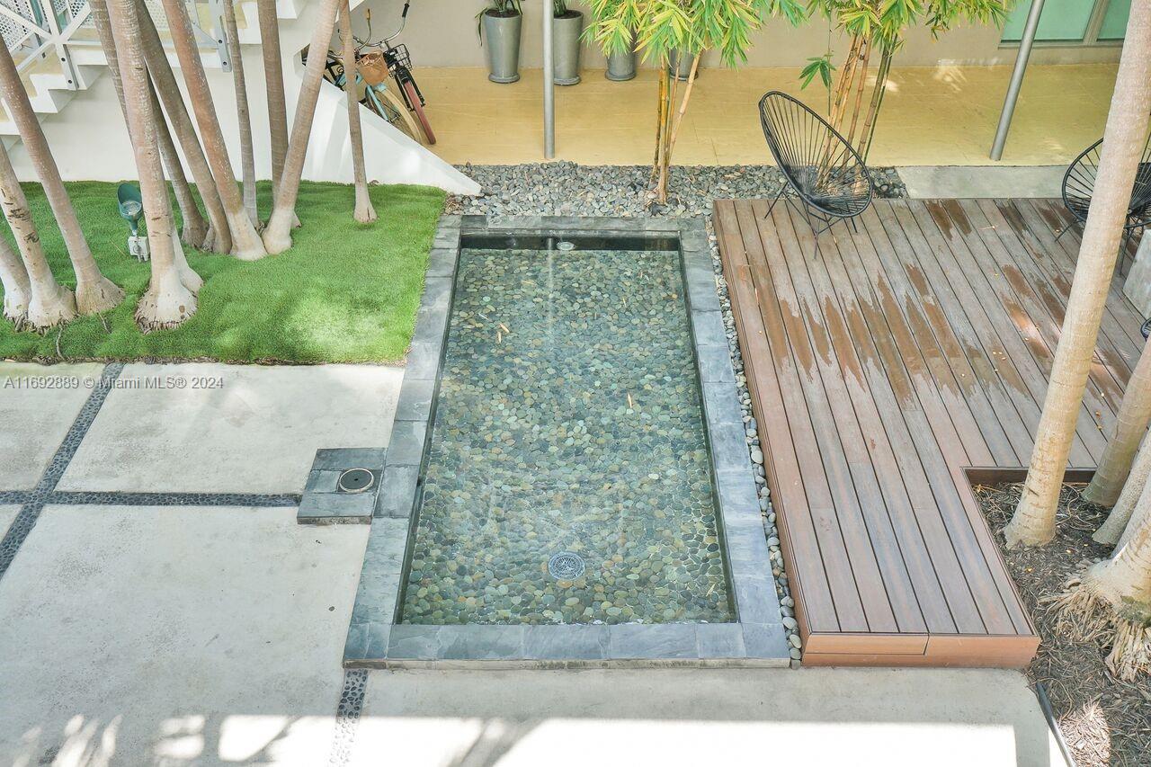 Resort Hideaway steps from Lincoln Road Mall and across the street from the Convention Center Park and Holocaust Memorial. Exquisitely furnished 2 bedroom in small secure building. Washer/Dryer in unit. Six blocks to the beach. Lovely serene courtyard. Daily rentals permitted through the Condo Hotel program. Wonderful opportunity for owners who visit Miami on short stays and still earn income. This unit is the best situated apartment in the building-second floor Bright Corner unit to the rear of the building away from the main street. Great beach apartment and/or Income property!