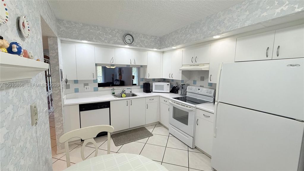 Photo of 12651 SW 16th Ct #202B, Pembroke Pines, FL 33027 (MLS # A12010856)