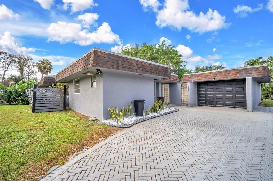 Welcome home to this beautiful 4 bedrooms 3 bath home in the sought after desired Woodlands community.  This is a must-see home designed for entertainment with a beautiful outdoor kitchen and a large pergola.  A perfect home for families or those seeking a bit of extra room. The primary bedroom boasted a large closet with plenty of space for all your needs.  The property offers easy access to schools, transportation options, malls, restaurants.  This one will not last. A/C is 2 years old; all bathrooms were updated 2 years ago.  Enjoy resort style living with access to community clubhouse and pool.  The property has two primary bedrooms.  Enjoy golf course views with no back yard neighbors.  Seller is motivated bring all your offers.