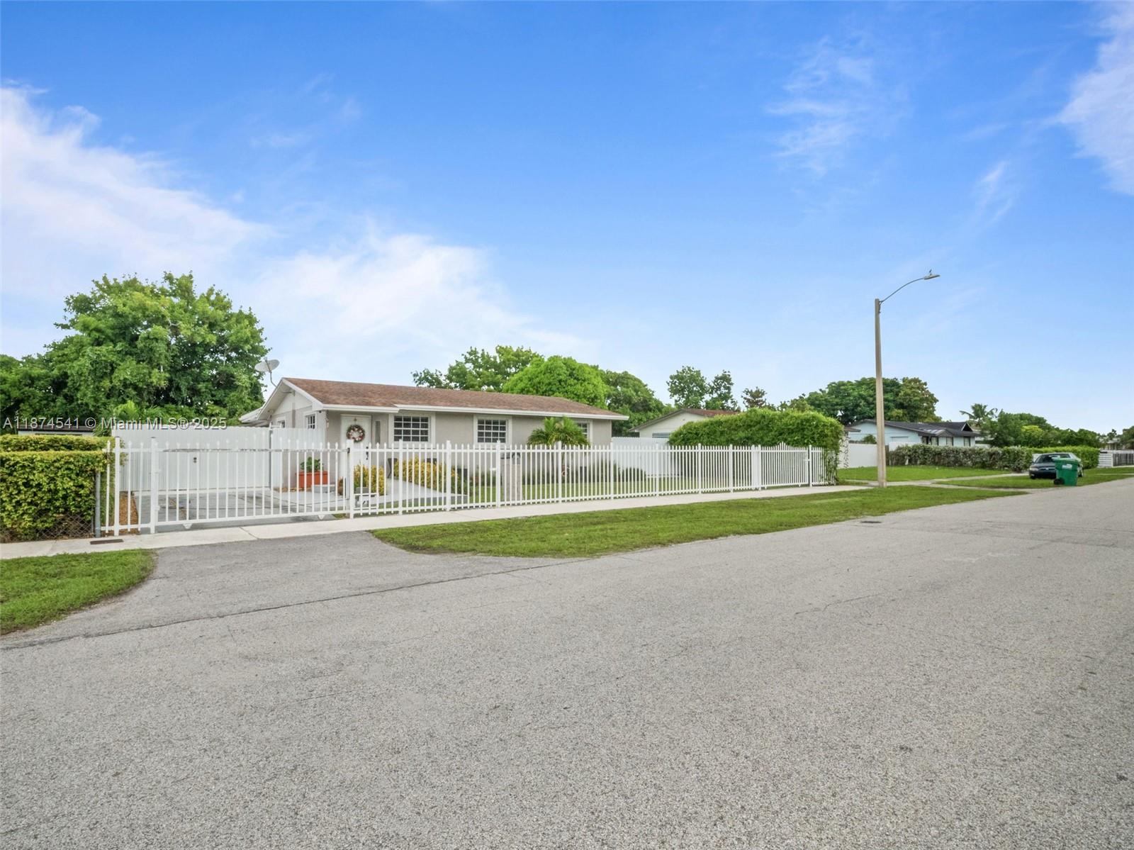 Lovely gated home with all accommodations to just move in , 2022 roof with spacious brand new large concrete terrace ready to enjoy . This is an amazing opportunity for a starter home.
