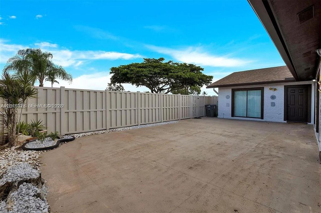 Photo of 9892 Boca Gardens Pkwy #A, Boca Raton, FL 33496 (MLS # A12015428)