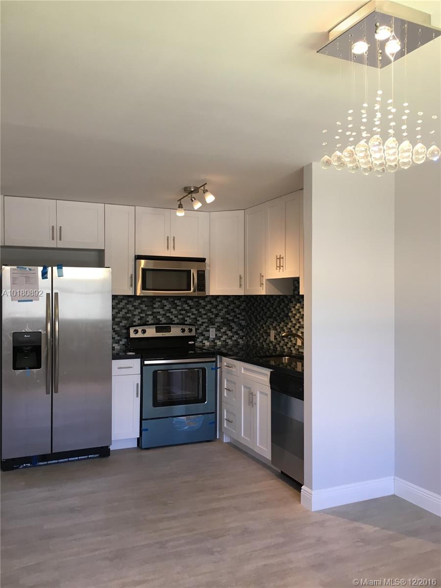 Absolutely magnificent 1bedroom,1.5 bath.Unit 2nd floor luxury with a garden and canal view. Located at Kings Point Condo 55 plus community.Unit has been totally remodeled. It features real hard wood cabinets in an expanding open kitchen; it sports new stainless steel appliances,beautiful granite counters with lovely floors throughout. High end washer and dryer in unit. New A/C and fan with 5 years warranty. Brand new water heater and spectacular finishes.
