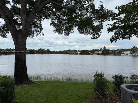 Photo of 2856 Cambridge Ln, Cooper City, FL 33026 (MLS # A12024455)