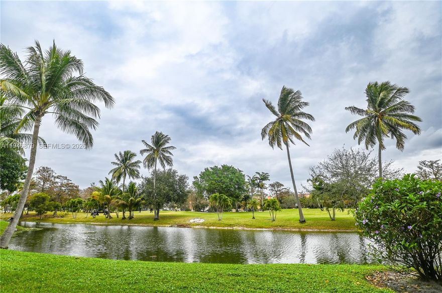 Relax & Enjoy the serene golf and water views from this beautifully maintained 1 bedroom, 1 bath condominium located in a desirable adult community in Lauderhill East (Bradley Hall Building). Enclosed patio overlooking a gorgeous golf course and canal view. Featuring impact windows, tile flooring throughout, and the convenience of parking directly in front of the unit. Offered fully furnished (turnkey), making it move-in ready. JUST BRING YOUR TOOTHBRUSH! Ideally situated close to Minutes to golf course, transportation, shopping, and restaurants. Residents enjoy an active lifestyle with numerous community activities and amenities. Community boasts garden areas, 2 swimming pools, BBQ picnic area, clubhouse, gym, library, billiards, shuffleboard & so much more!! A perfect seasonal retreat or full-time residence. TRULY A MUST SEE!
