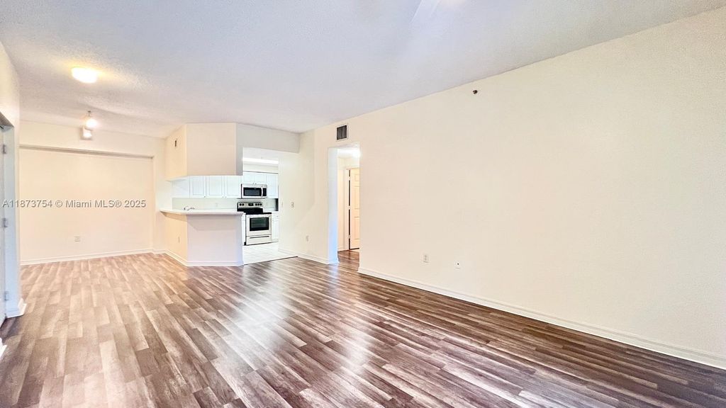 Photo of 3019 Alcazar Pl #202, Palm Beach Gardens, FL 33410 (MLS # A11873754)