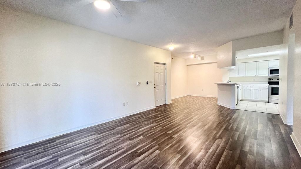 Photo of 3019 Alcazar Pl #202, Palm Beach Gardens, FL 33410 (MLS # A11873754)