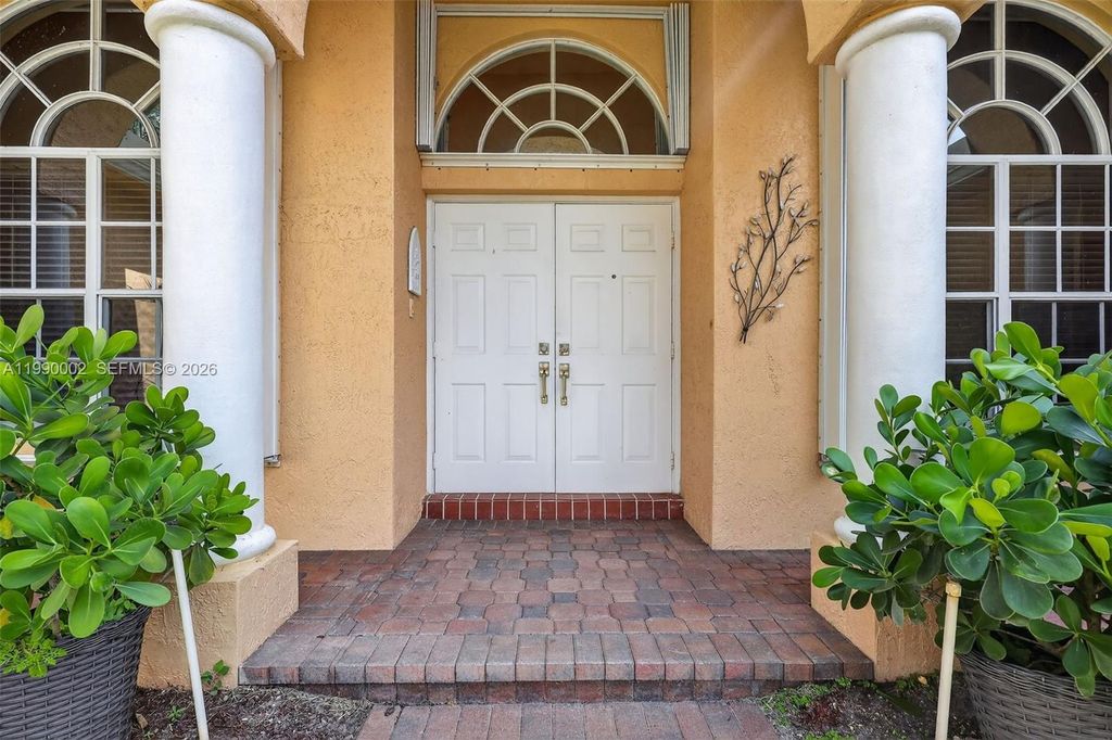 Photo of 1845 NW 139th Ter, Pembroke Pines, FL 33028 (MLS # A11990002)