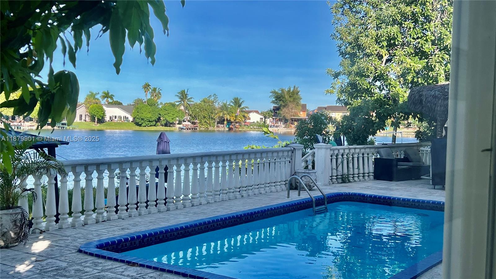 Welcome to your dream home! This stunning 4/3 home nestled in a serene neighborhood features a spacious floor plan, ideal for family living and entertaining with a natural lake.This home has a beautiful kitchen with open layout. Offering a luxurious master suite is a plus with a walk-in closet, spa-like ensuite bathroom, complete with a soaking tub shower. Three additional bedrooms offer plenty of space for family, guests, or home office. Step outside to your private oasis with kayaking and a full size pool and tiki bar! The beautifully landscaped backyard features a sparkling pool, covered patio area. Large parking on the side of the house to park your boat provides ample parking and storage space. This home is close to great schools, parks, shopping, and dining. Schedule a showing today!