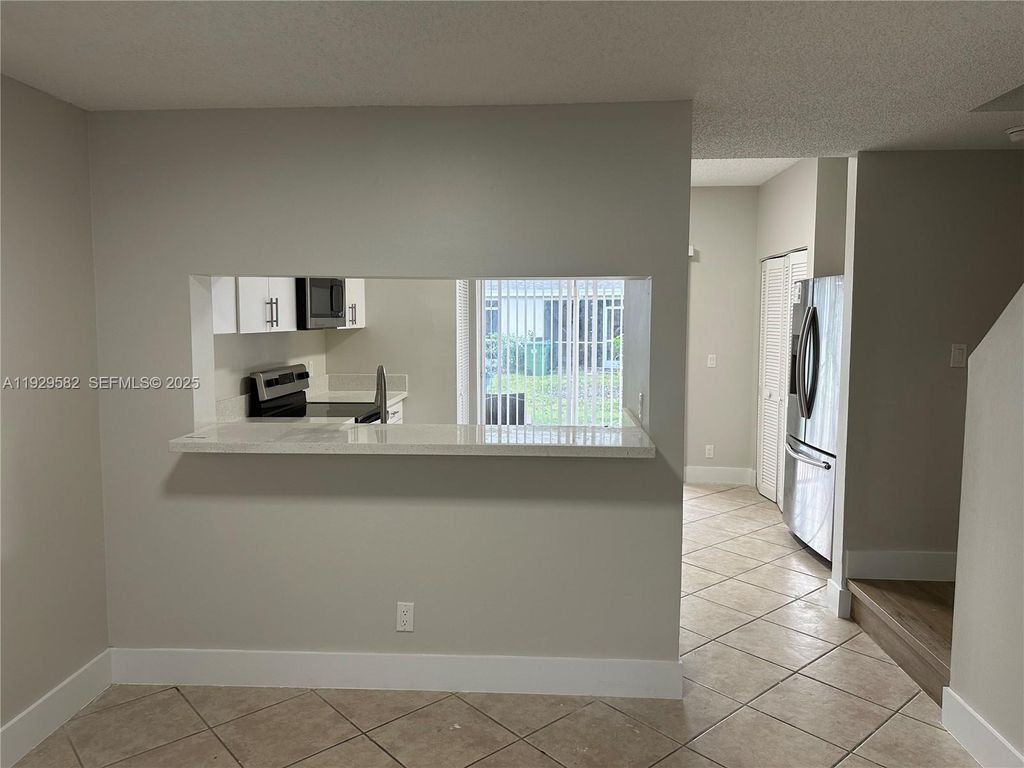 Photo of 17 Simonton Cir, Weston, FL 33326 (MLS # A11929582)